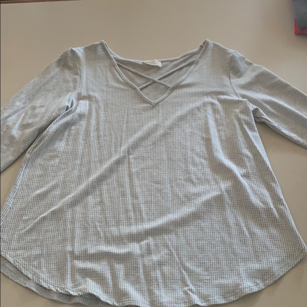 Women’s 3/4 sleeve shirt.